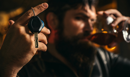 Drink and drive. Car keys and alcohol. Stop alcohol addiction.