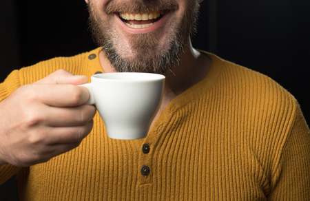 Hard Coffee addict. My smile is not perfect. Dental care concept. Healthy white smile. Laser teeth whitening.の写真素材