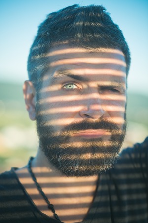 Taking his moustache into account. Beard fashion trend. Bearded man with shadow on face. Handsome...