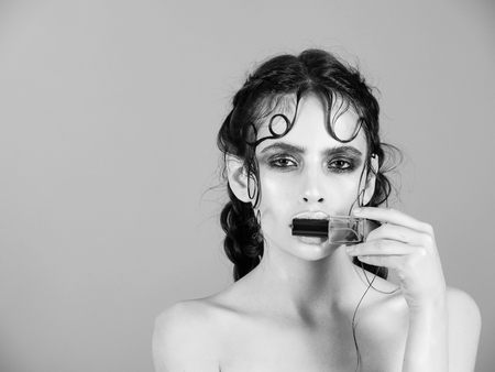 girl with shining makeup and stylish hair braidsの写真素材