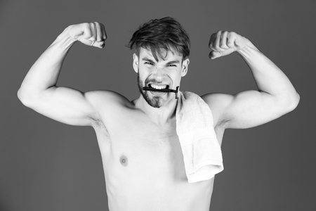 athlete showing strong arm with biceps, tricepsの写真素材
