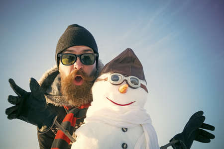 Snowman pilot, winter holiday celebration.の写真素材