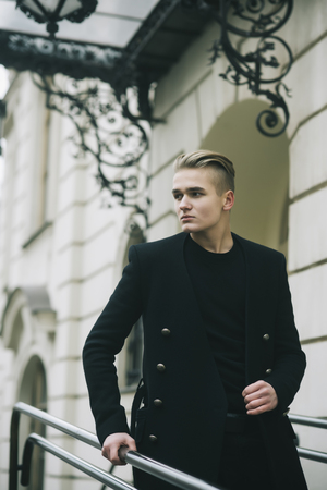 Male fashion, trendy style, walk, town concept.の写真素材