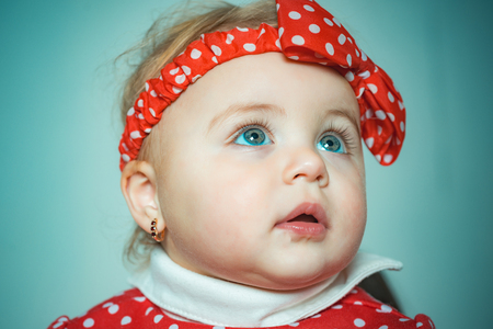 Portrait Funny kid baby. Christmas kids. Cute little kids portrait close-up.の写真素材