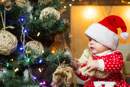 Cute little kids celebrating Christmas. kiddy. Happy child with christmas gift.の写真素材