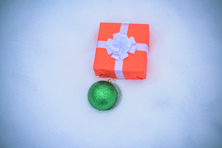 Christmas gifts on snow background. Christmas Day, Christmas Eve. New year background.の写真素材