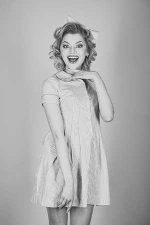 Sexy blond girl with elegant makeup, pinup.の写真素材