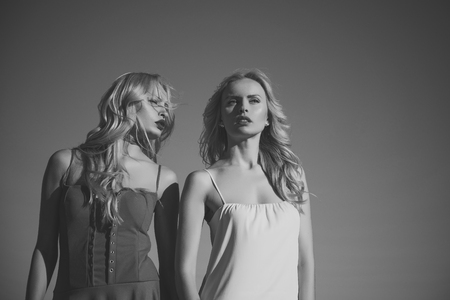 Girls with sexy legs, family and sisters.の写真素材