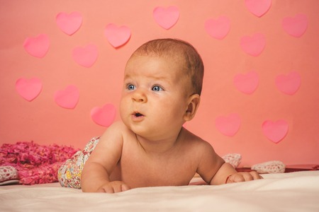 Cute and curious baby. Family. Child care. Childrens day. Sweet little baby. New life and baby birth. Portrait of happy little child. Small girl with cute face. parenting. Childhood and happiness.の写真素材