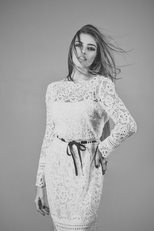 Woman in stylish dress, glamour, elegance. Fashion and beauty, look, sexy girl. Fashion model pose in studio, beauty. Sensual woman in fashionable dress, style. Makeup, hairdresser, cosmetics, look.の写真素材