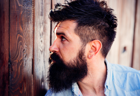 Must have beard. Handsome man with fashion beard and mustache. Bearded man with stylish hair. Barber shop or barbershop. Beard fashion trend. Barber is important in a mans life.の写真素材