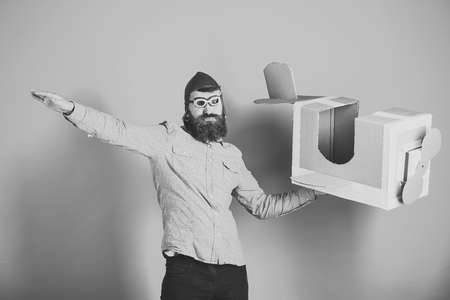 dad playing with toy aeroplaneの写真素材