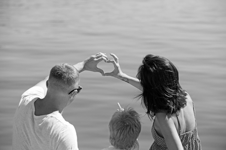 Love and trust as family values. Family travel with kid on mothers or fathers day. Summer vacation...