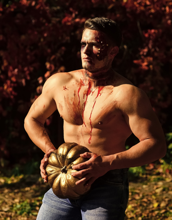 Halloween demon with muscular body and makeup.の写真素材