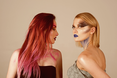 Hair and hairstyle. Women with long dye hair and creative makeup. Hair care. I love healthy hairの写真素材