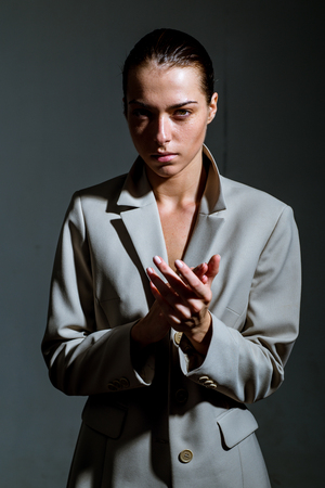 Business woman. Beautiful female. Power, courage,fierceness and strength. Fashion model.の写真素材