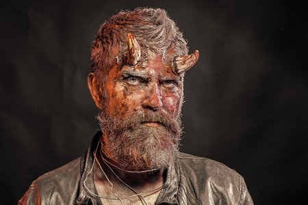 Halloween man devil on black backgroundの写真素材