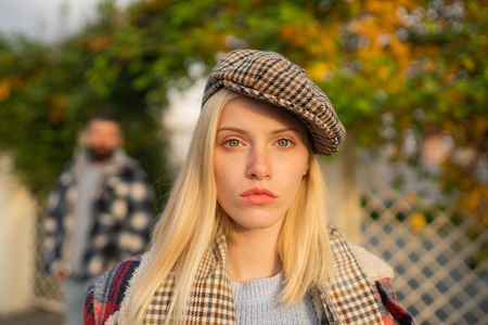 Manly world. Pretty woman in hat. Woman wear checkered clothes nature background. Girl wear kepi....