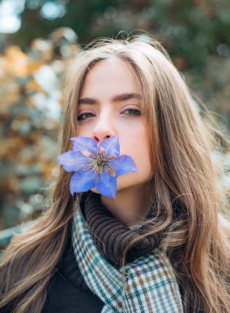 Happy girl in Autumn Park. Retouched and natural light. Enjoying good weather. Fall concept.