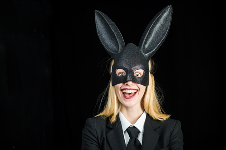 Sexy model dressed in costume Easter bunny. Pretty bunny girl winking and tongue out. Easter woman with sexy bunny costume. Pretty bunny girl winking and tongue out.の写真素材