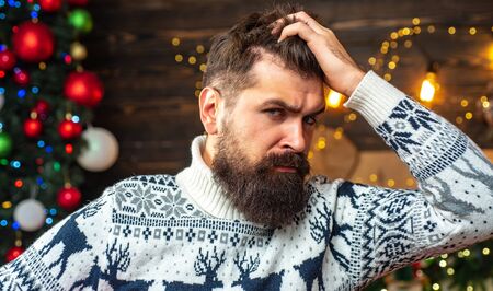 Hipster santa claus. Santa in home. New year gift. Thanksgiving day and Christmas. Gift emotions. New year fashion clothes.の写真素材