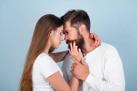 Romantic moment. Secrets fantasy. Satisfied girlfriend and boyfriend enjoying romantic moment. Young...