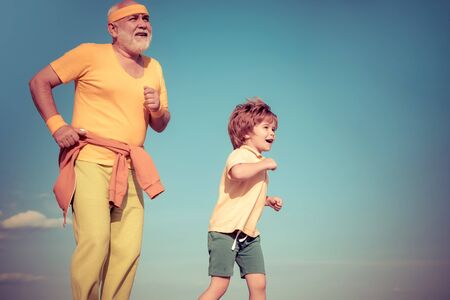 Jog and run marathon for family. Energetic excited. Healthy old young lifestyle.の写真素材