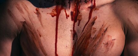 3Halloween or horror concept - screaming walking dead zombie. 1 october. Skull make up portrait of young man. Make up and scary concept for man. Celebration party. Hot guy. Fitnessの写真素材