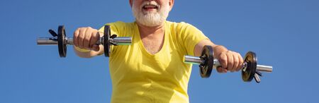 Elderly man after her workout. Senior man in health club. Senior man workout in rehabilitation...