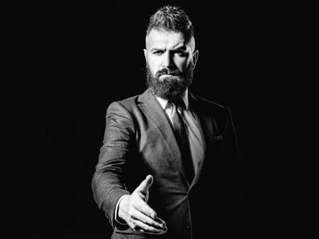 Welcome to business. Businessman greeting. Power man and business. Serious business man congratulation.の写真素材