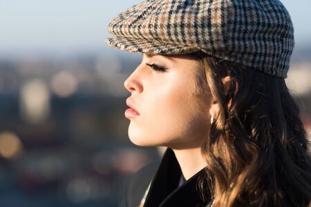 Beauty and fashion look. Looking trendy. Confident in her choice. french girl with curly hair in...