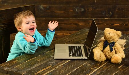Technology concept. Little child use laptop computer, technology. Technology in elementary school....