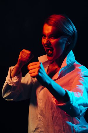 Angry woman with fashion makeup. Knockout and punch. Crazy party with fight. Sexy girl with fashion makeup. Happy halloween. Makeup cosmetics and skincare. You drives me mad. Ambitious and beautifulの写真素材