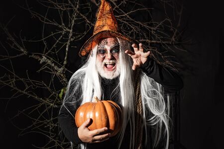 Halloween Devil with bloody professional makeup. Halloween. Devil man on Halloween night. Halloween man with Blood make up.の写真素材