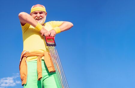 Senior man in health club. Senior man workout in rehabilitation center. Healthcare cheerful lifestyle. Healthy and sport. Age is no excuse to slack on your health. Be in motion.の写真素材