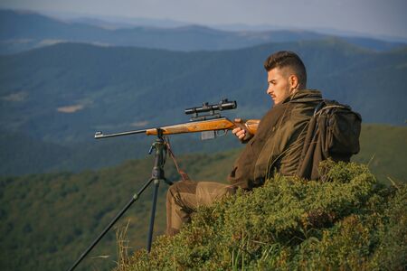 Illegal Hunting Poacher in the Forest. Hunter on Big game or small game. Hunting Gear - Hunting Supplies and Equipment. Hunting - Men hobby.の写真素材