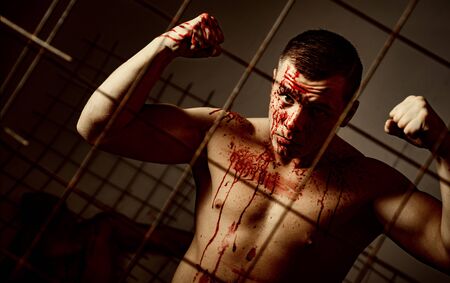 Psychic disease. Murderer brutal aggressive guy. Halloween concept. Aggressive person. Injured...