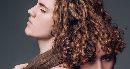 Lovely couple have warm cuddle. Fashion portrait of a beautiful sexy couple. Muscular man. Pose for family portrait. Tender picture of young couple. Smile joyfully have good relationships.の写真素材