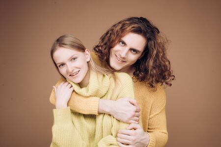 Gentle romantic couple celebrates the day of all lovers. Happy Joyful couple. Hugging and enjoying spending time together while celebrating Saint Valentines Day.の写真素材