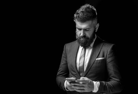 Top manager, business confident. Businessman in dark grey suit. Man in classic suit, shirt and tie.