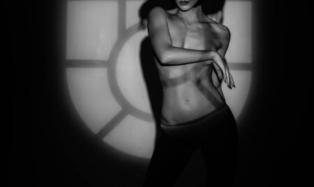 Night time halloween party for adult. Sexy stripper Woman with pumpkins. vampire girls. Sunsual desire concept. Halloween lingerie model.の写真素材