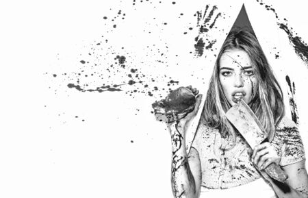 Steak or beefsteak - bloody meat. Sexy woman covered in blood holding knife. Revenge of the lover....