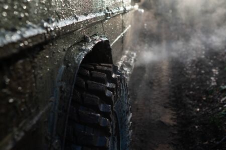 Close-up dirty jeep. Off-road car on mountain road. Provide the best experience for the offroader....