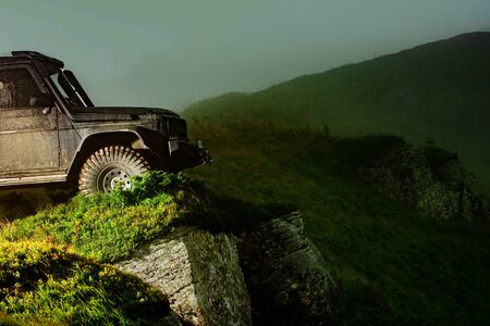 Off-road vehicle stuck on impenetrable road after rain in the countryside. Offroad travel on...