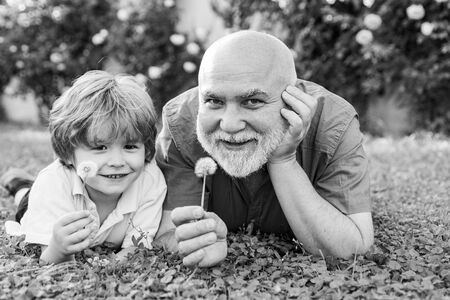 Two generation - weekend together. Two different generations ages: grandfather and grandson...