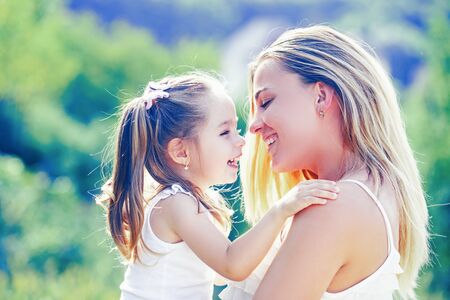 Child love. Happy family and lovely mom and daughter spend time together - mothers day. Mothers day....
