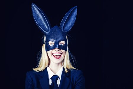 Sexy model dressed in costume Easter bunny. Pretty bunny girl winking and tongue out. Easter woman with sexy bunny costume. Pretty bunny girl winking and tongue out.の写真素材