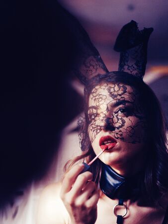 Fashion portrait of beautiful sensual woman. Sexy woman in lingerie. Fashion girls. Beautiful sensual girl in a rabbit costume make make-up.の写真素材