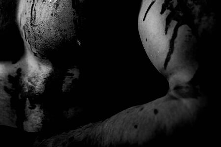 Psycho mad man. Murderer brutal aggressive guy. Aggressive person. Injured soldier. Chest muscular...