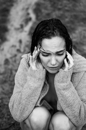 Love story. Sexy young wet woman. Crying depressed. Love. Passion, beautiful girl. Woman in love.の写真素材